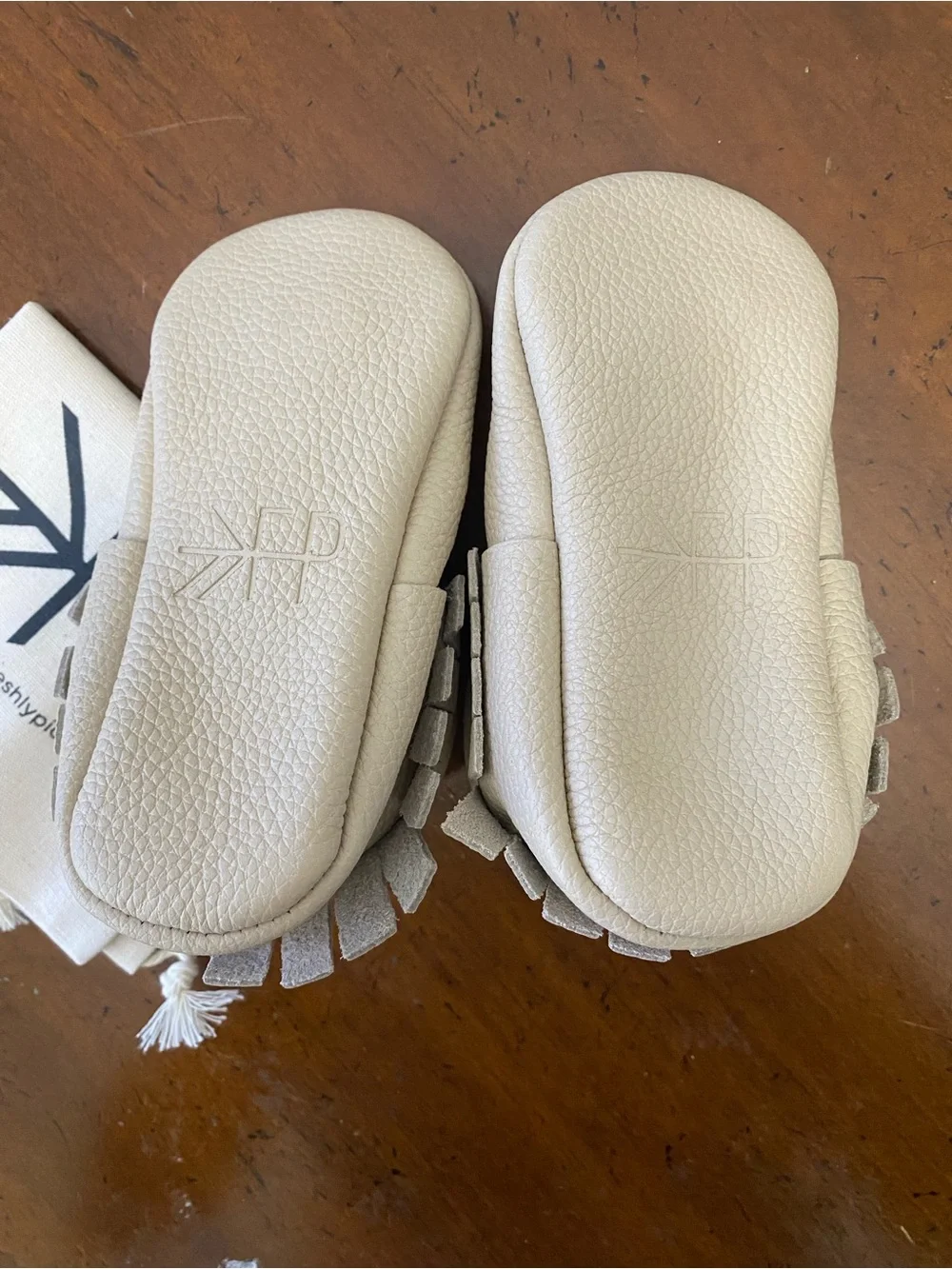 Freshly Picked Cream Moccasins with Fringe Detail